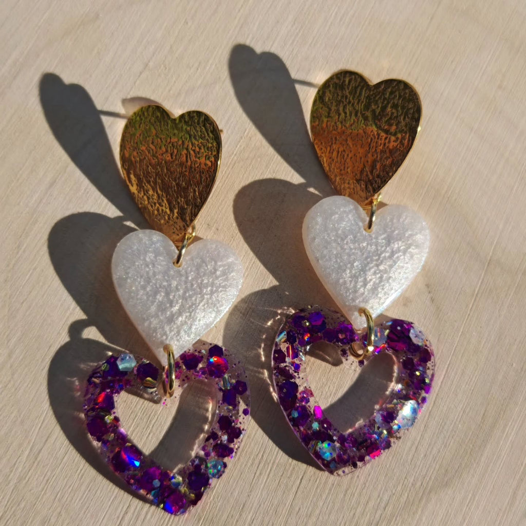 Trois cœurs — nacre, violet, doré