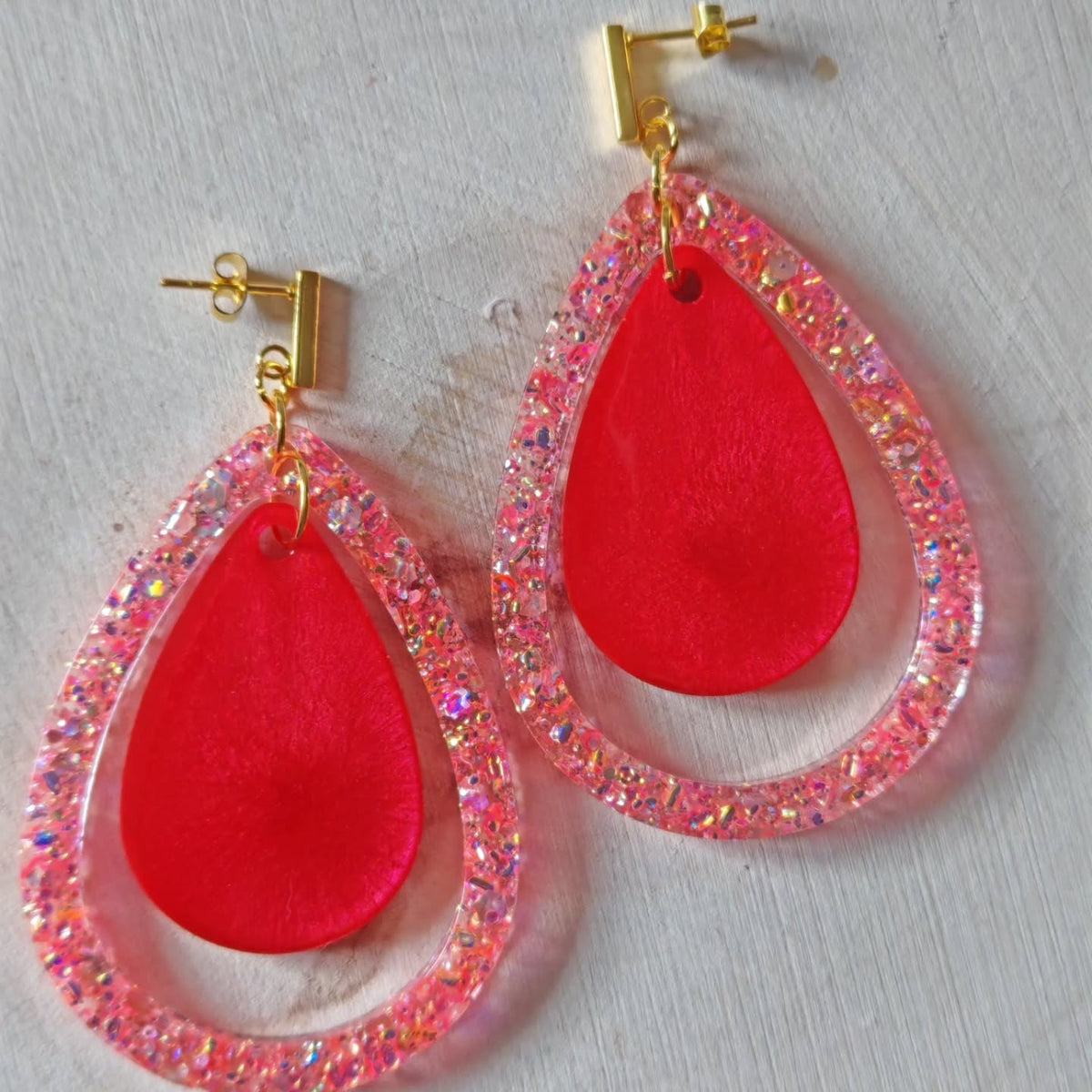 Gouttes corail et liseré pailleté